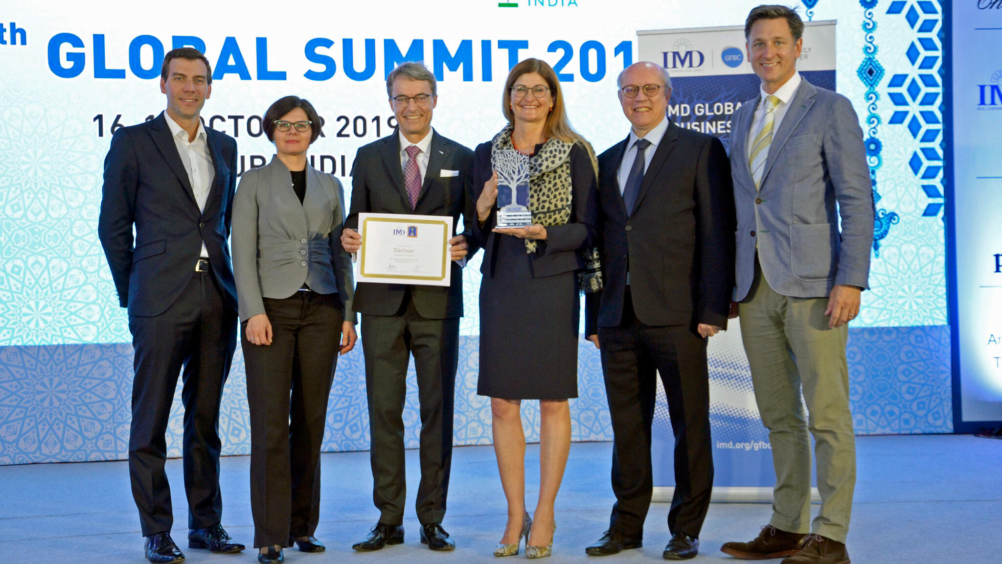 Prof. Peter Vogel, Director of IMD Global Family Business Center; Marta Widz, IMD Research Fellow; Bernhard Simon, CEO DACHSER SE; Birgit Kastner-Simon, Corporate Director Corporate Marketing, DACHSER SE; Prof. Benoit Leleux, IMD Global Family Business Award Director; Matthew Crudgington, Associate Director, IMD Global Family Business Center Prof. Peter Vogel, Director of IMD Global Family Business Center; Marta Widz, IMD Research Fellow; Bernhard Simon, CEO DACHSER SE; Birgit Kastner-Simon, Corporate Director Corporate Marketing, DACHSER SE; Prof. Benoit Leleux, IMD Global Family Business Award Director; Matthew Crudgington, Associate Director, IMD Global Family Business Center